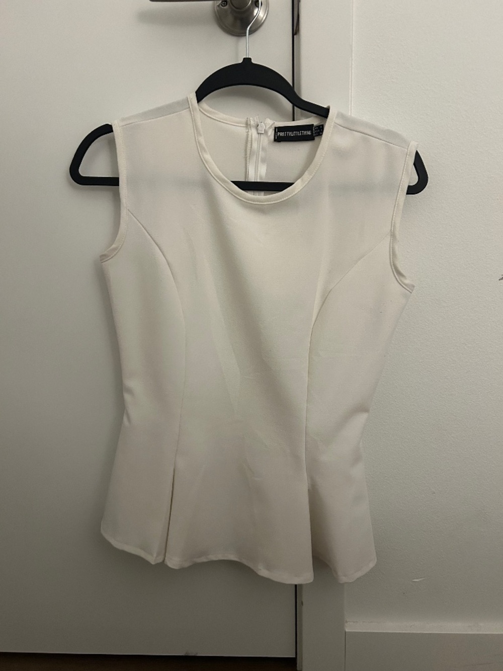 White peplum top
